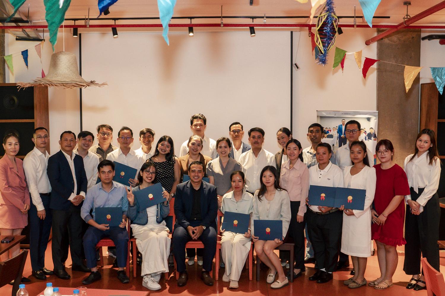 MAP Batch 1 graduating cohort holding certificates
